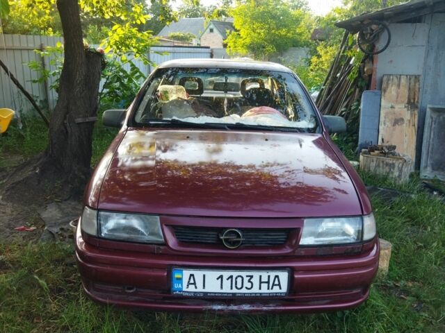 Червоний Опель Вектра, об'ємом двигуна 2 л та пробігом 250 тис. км за 500 $, фото 1 на Automoto.ua