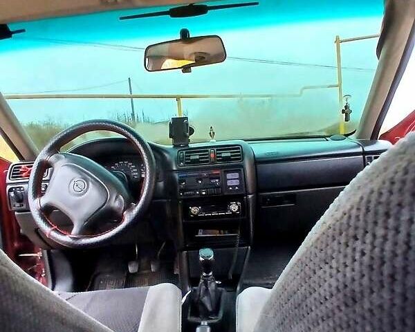 Опель Вектра 1995 в Коростене на Automoto.ua Красный Опель Вектра, объемом двигателя 2 л и пробегом 318 тыс. км за 2300 $, фото 1 на Automoto.ua