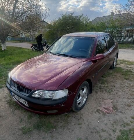 Красный Опель Вектра, объемом двигателя 2.5 л и пробегом 300 тыс. км за 2000 $, фото 1 на Automoto.ua
