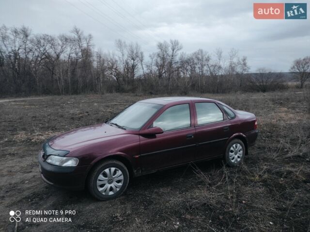 Красный Опель Вектра, объемом двигателя 1.6 л и пробегом 250 тыс. км за 2500 $, фото 1 на Automoto.ua