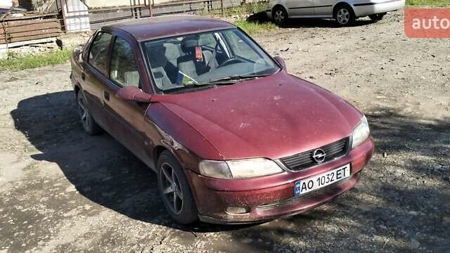 Красный Опель Вектра, объемом двигателя 1.6 л и пробегом 325 тыс. км за 1399 $, фото 1 на Automoto.ua