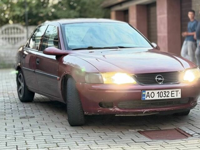 Червоний Опель Вектра, об'ємом двигуна 1.6 л та пробігом 300 тис. км за 1106 $, фото 1 на Automoto.ua
