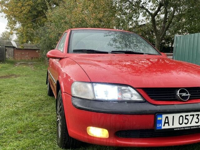 Червоний Опель Вектра, об'ємом двигуна 2 л та пробігом 259 тис. км за 3000 $, фото 1 на Automoto.ua