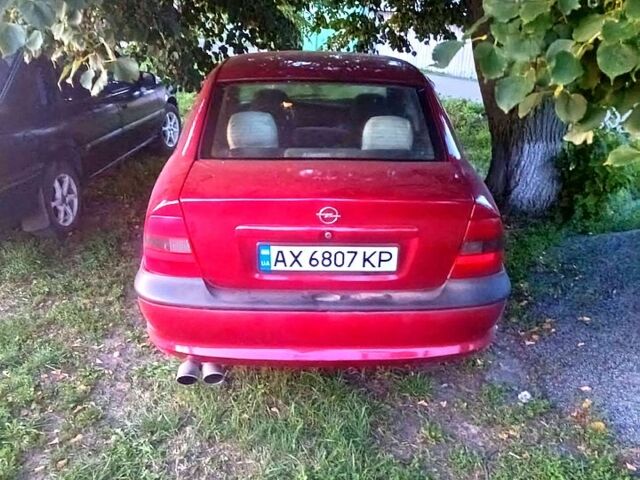 Красный Опель Вектра, объемом двигателя 1.8 л и пробегом 400 тыс. км за 2300 $, фото 1 на Automoto.ua