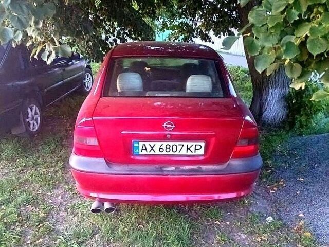 Красный Опель Вектра, объемом двигателя 1.8 л и пробегом 400 тыс. км за 2300 $, фото 1 на Automoto.ua