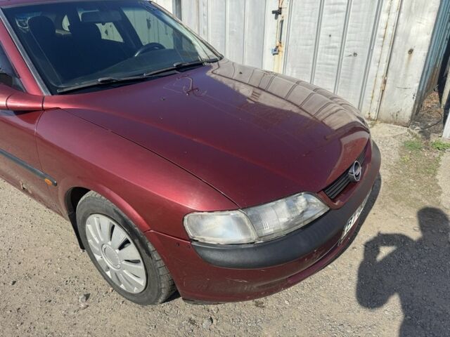 Красный Опель Вектра, объемом двигателя 1.6 л и пробегом 348 тыс. км за 1250 $, фото 1 на Automoto.ua