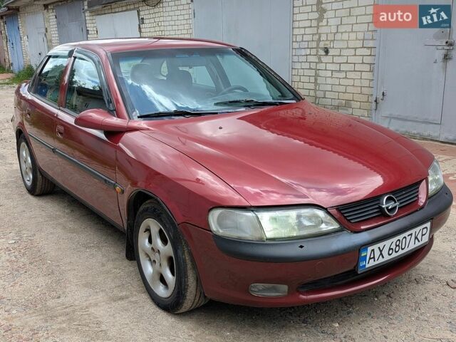 Красный Опель Вектра, объемом двигателя 1.8 л и пробегом 260 тыс. км за 1850 $, фото 1 на Automoto.ua