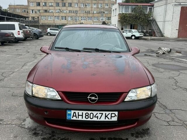 Красный Опель Вектра, объемом двигателя 1.6 л и пробегом 350 тыс. км за 1300 $, фото 1 на Automoto.ua