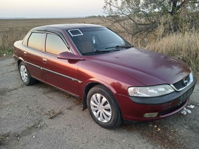 Красный Опель Вектра, объемом двигателя 1.6 л и пробегом 400 тыс. км за 1500 $, фото 1 на Automoto.ua