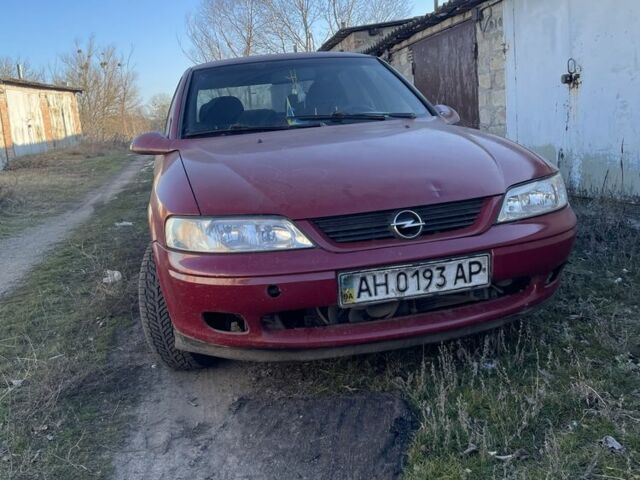 Красный Опель Вектра, объемом двигателя 1.8 л и пробегом 420 тыс. км за 1250 $, фото 1 на Automoto.ua