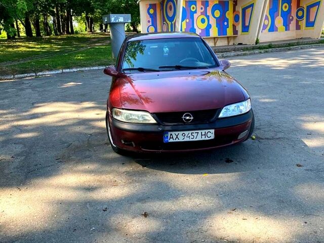 Червоний Опель Вектра, об'ємом двигуна 2 л та пробігом 250 тис. км за 2600 $, фото 1 на Automoto.ua
