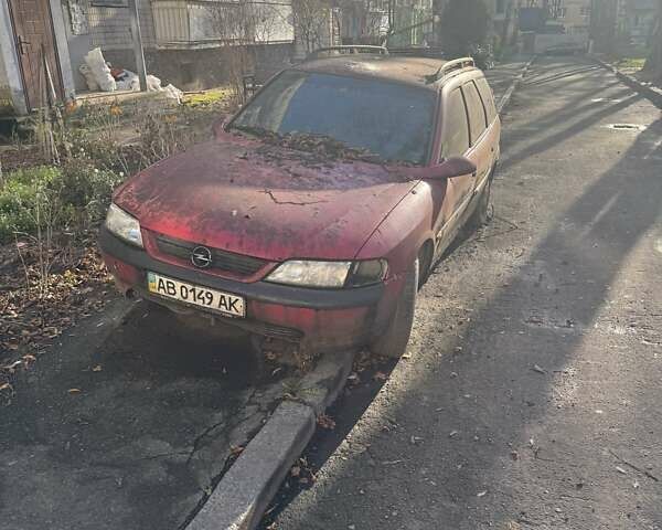 Красный Опель Вектра, объемом двигателя 0 л и пробегом 100 тыс. км за 600 $, фото 1 на Automoto.ua
