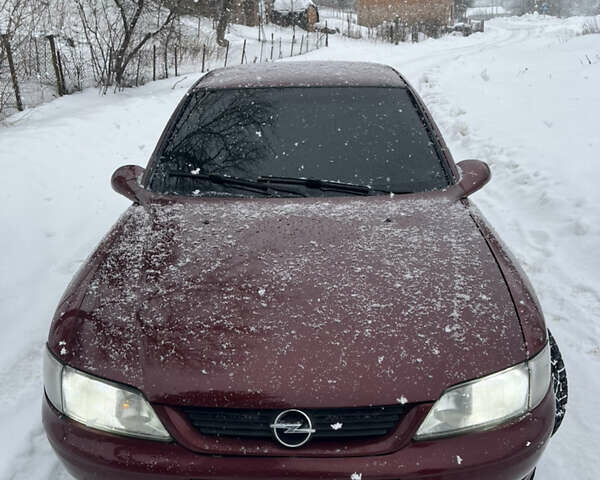 Красный Опель Вектра, объемом двигателя 1.8 л и пробегом 325 тыс. км за 1899 $, фото 1 на Automoto.ua