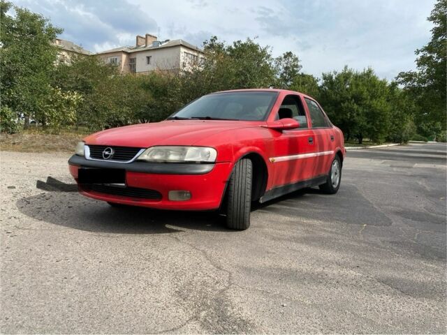 Червоний Опель Вектра, об'ємом двигуна 0 л та пробігом 250 тис. км за 900 $, фото 1 на Automoto.ua