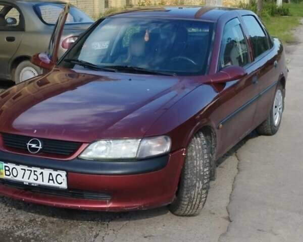 Красный Опель Вектра, объемом двигателя 1.6 л и пробегом 285 тыс. км за 2600 $, фото 1 на Automoto.ua