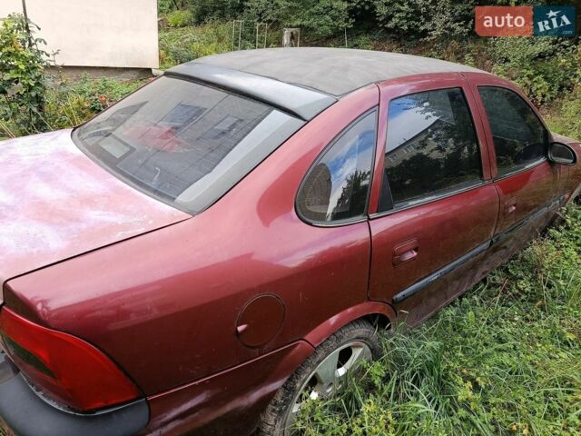Червоний Опель Вектра, об'ємом двигуна 2 л та пробігом 175 тис. км за 1500 $, фото 1 на Automoto.ua
