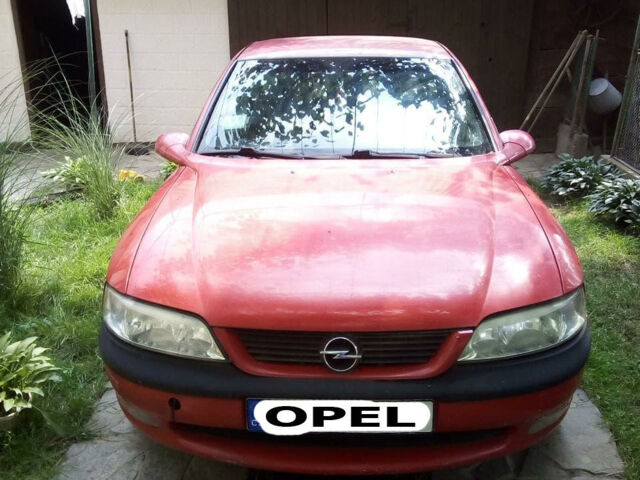 Красный Опель Вектра, объемом двигателя 1.6 л и пробегом 280 тыс. км за 900 $, фото 1 на Automoto.ua