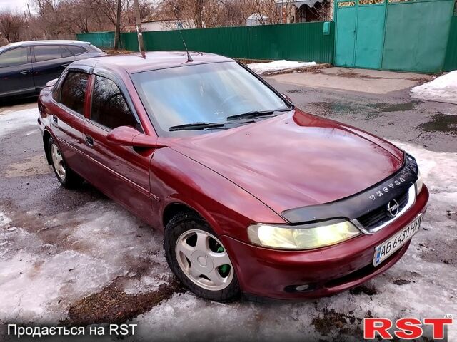 Красный Опель Вектра, объемом двигателя 1.6 л и пробегом 380 тыс. км за 2600 $, фото 1 на Automoto.ua