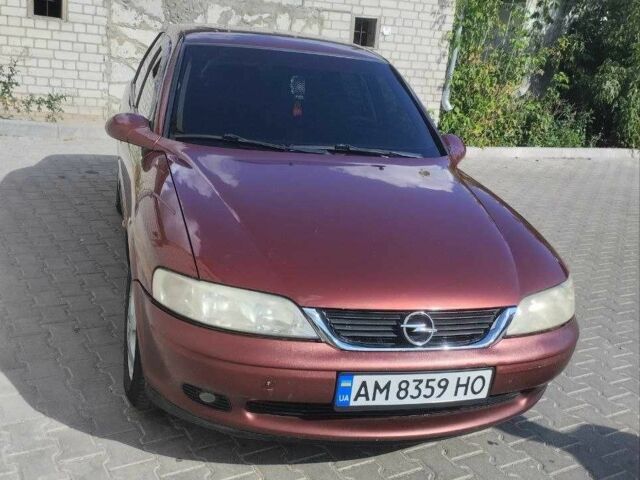 Красный Опель Вектра, объемом двигателя 1.8 л и пробегом 293 тыс. км за 2900 $, фото 1 на Automoto.ua