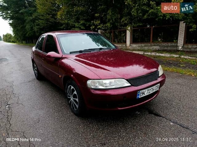 Красный Опель Вектра, объемом двигателя 1.6 л и пробегом 300 тыс. км за 1350 $, фото 1 на Automoto.ua