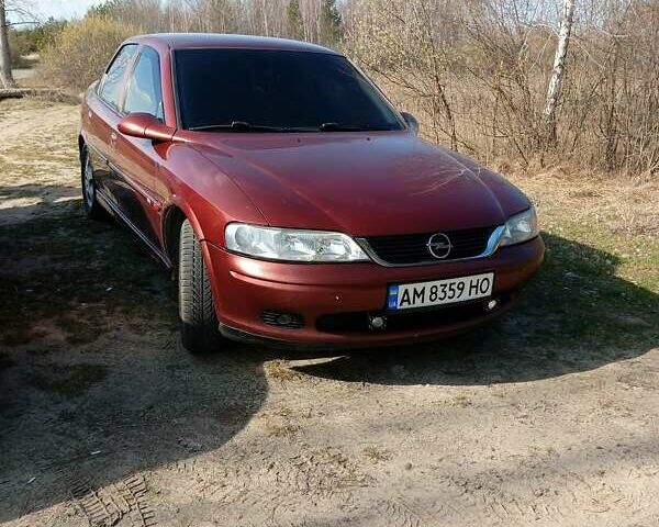 Красный Опель Вектра, объемом двигателя 1.8 л и пробегом 302 тыс. км за 3200 $, фото 1 на Automoto.ua