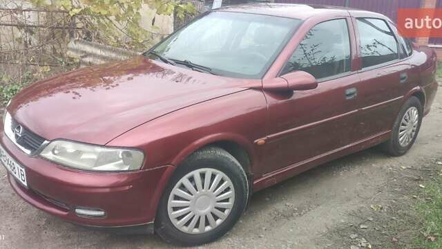 Красный Опель Вектра, объемом двигателя 1.8 л и пробегом 280 тыс. км за 2750 $, фото 1 на Automoto.ua