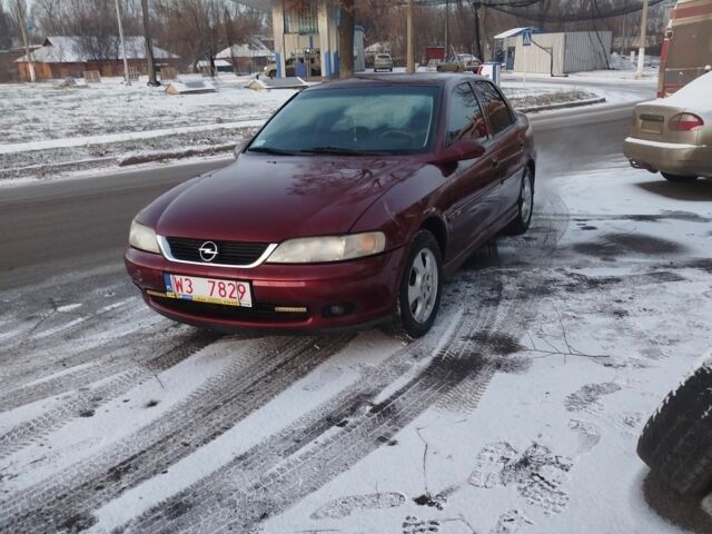 Красный Опель Вектра, объемом двигателя 2 л и пробегом 235 тыс. км за 1539 $, фото 1 на Automoto.ua