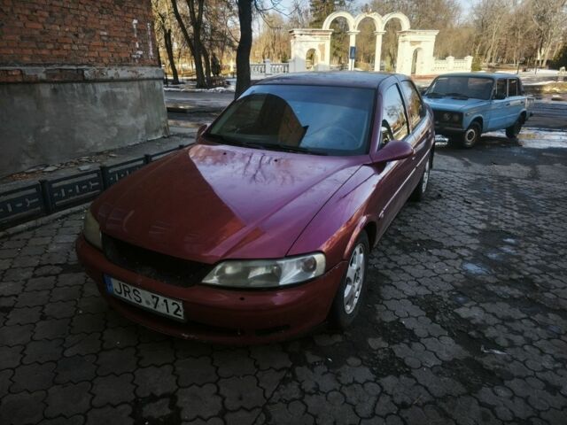Красный Опель Вектра, объемом двигателя 2 л и пробегом 275 тыс. км за 950 $, фото 1 на Automoto.ua