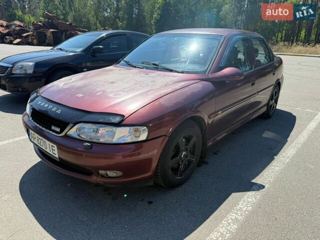 Красный Опель Вектра, объемом двигателя 1.8 л и пробегом 480 тыс. км за 3000 $, фото 1 на Automoto.ua