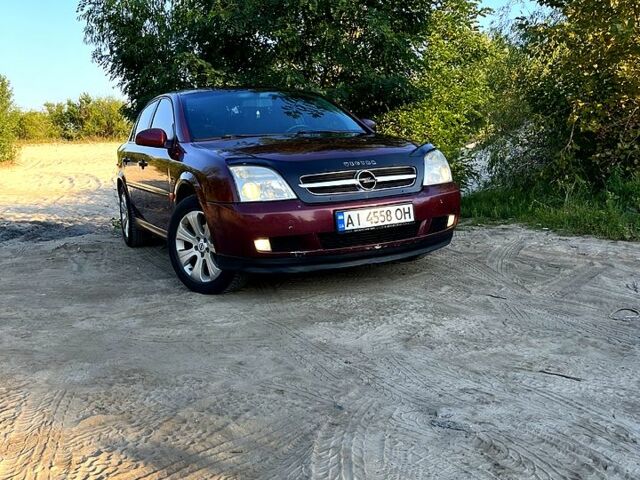 Красный Опель Вектра, объемом двигателя 2.2 л и пробегом 330 тыс. км за 3690 $, фото 1 на Automoto.ua