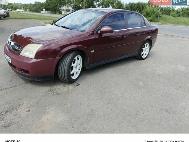 Красный Опель Вектра, объемом двигателя 2.2 л и пробегом 350 тыс. км за 4500 $, фото 1 на Automoto.ua