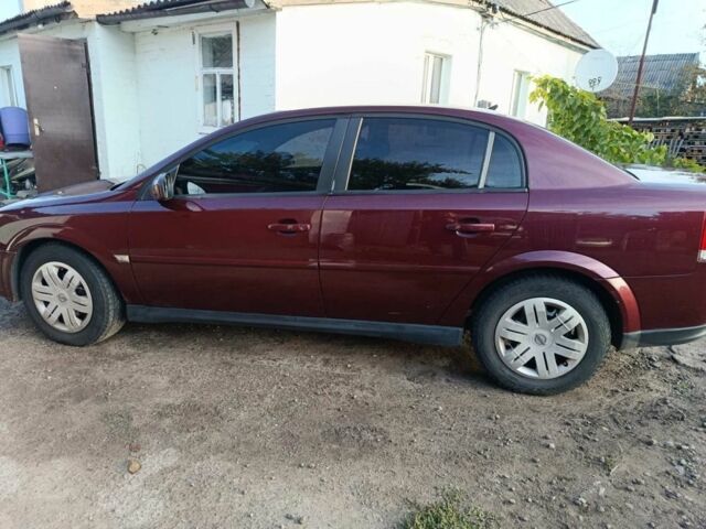 Красный Опель Вектра, объемом двигателя 2 л и пробегом 394 тыс. км за 2000 $, фото 1 на Automoto.ua