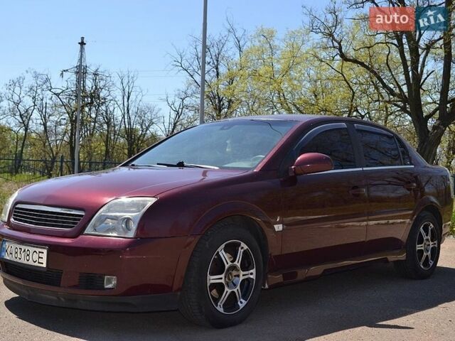 Красный Опель Вектра, объемом двигателя 2.2 л и пробегом 266 тыс. км за 3300 $, фото 1 на Automoto.ua