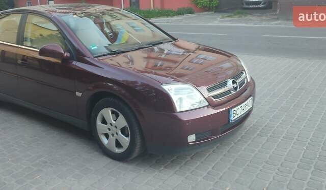 Красный Опель Вектра, объемом двигателя 2.2 л и пробегом 246 тыс. км за 4550 $, фото 1 на Automoto.ua
