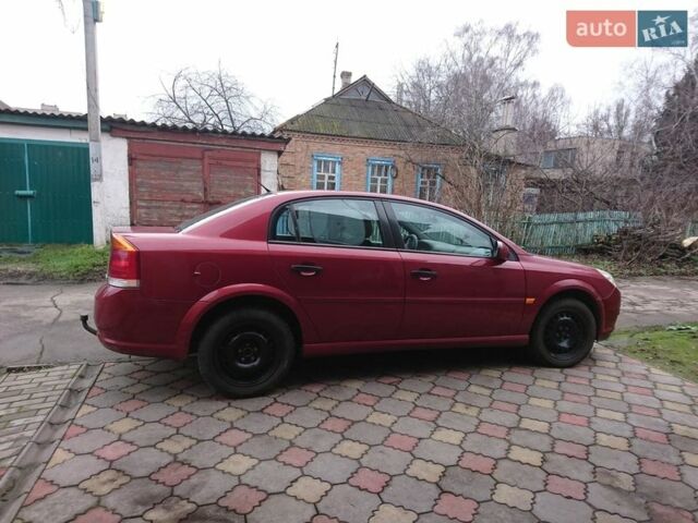 Красный Опель Вектра, объемом двигателя 2.2 л и пробегом 236 тыс. км за 5900 $, фото 1 на Automoto.ua