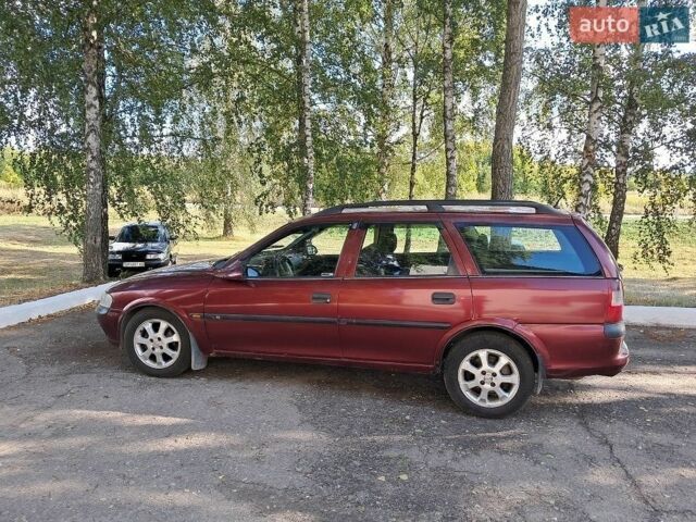 Красный Опель Вектра, объемом двигателя 1.8 л и пробегом 396 тыс. км за 1698 $, фото 1 на Automoto.ua
