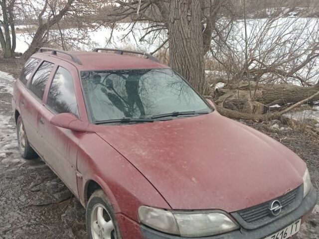 Червоний Опель Вектра, об'ємом двигуна 2 л та пробігом 220 тис. км за 1800 $, фото 1 на Automoto.ua