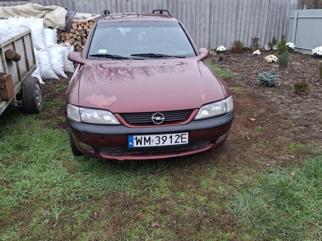 Красный Опель Вектра, объемом двигателя 2 л и пробегом 300 тыс. км за 1600 $, фото 1 на Automoto.ua