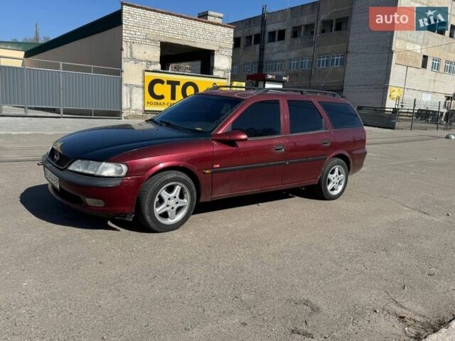 Красный Опель Вектра, объемом двигателя 2 л и пробегом 200 тыс. км за 1600 $, фото 1 на Automoto.ua
