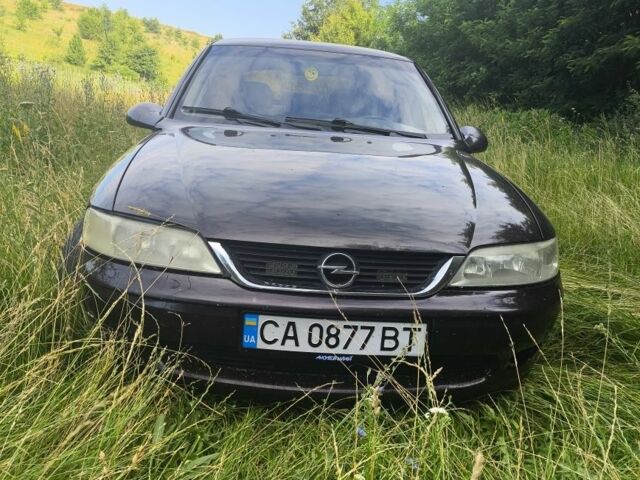 Червоний Опель Вектра, об'ємом двигуна 1 л та пробігом 370 тис. км за 2500 $, фото 1 на Automoto.ua