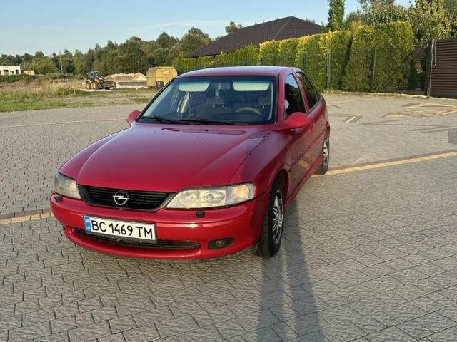 Красный Опель Вектра, объемом двигателя 2 л и пробегом 387 тыс. км за 2300 $, фото 1 на Automoto.ua