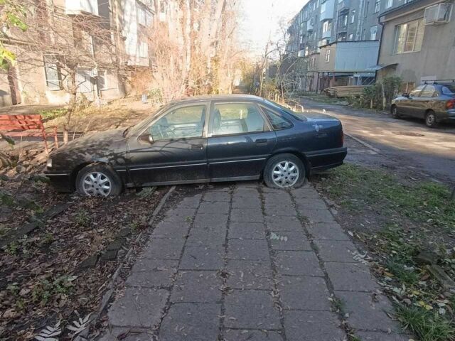 Серый Опель Вектра, объемом двигателя 2 л и пробегом 200 тыс. км за 932 $, фото 1 на Automoto.ua