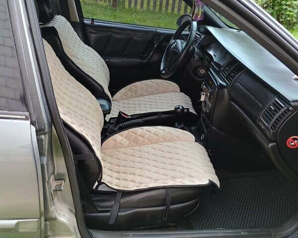 Серый Опель Вектра, объемом двигателя 2 л и пробегом 412 тыс. км за 2500 $, фото 1 на Automoto.ua