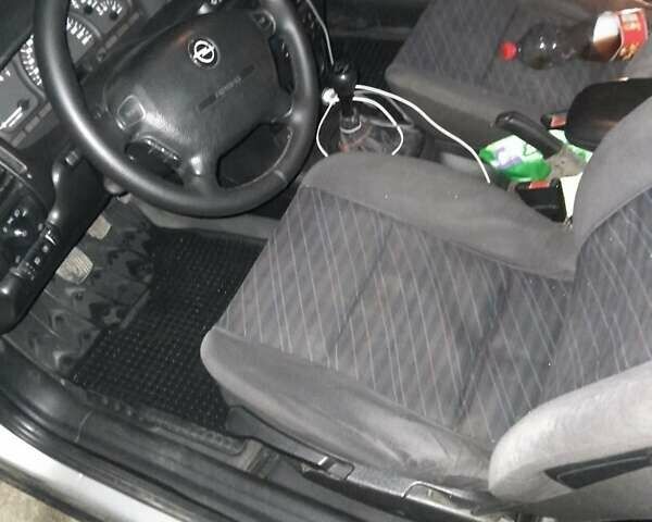 Серый Опель Вектра, объемом двигателя 2 л и пробегом 400 тыс. км за 2100 $, фото 1 на Automoto.ua