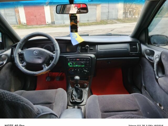 Сірий Опель Вектра, об'ємом двигуна 2 л та пробігом 345 тис. км за 2000 $, фото 1 на Automoto.ua