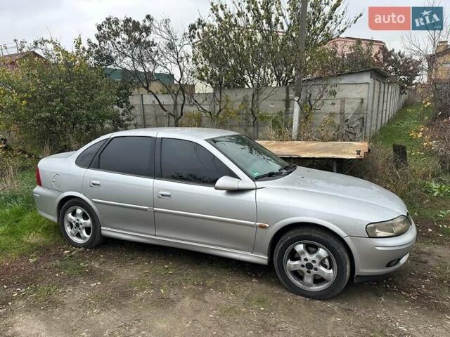 Серый Опель Вектра, объемом двигателя 1.8 л и пробегом 246 тыс. км за 4100 $, фото 1 на Automoto.ua