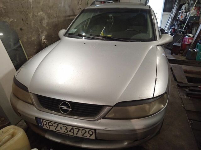 Серый Опель Вектра, объемом двигателя 2 л и пробегом 340 тыс. км за 828 $, фото 1 на Automoto.ua