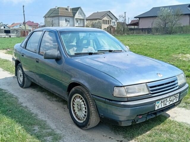 Синий Опель Вектра, объемом двигателя 2 л и пробегом 294 тыс. км за 650 $, фото 1 на Automoto.ua
