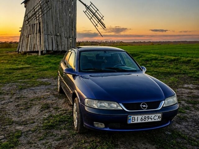 Синий Опель Вектра, объемом двигателя 1.8 л и пробегом 430 тыс. км за 2476 $, фото 1 на Automoto.ua