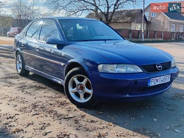 Синий Опель Вектра, объемом двигателя 1.8 л и пробегом 450 тыс. км за 1100 $, фото 1 на Automoto.ua